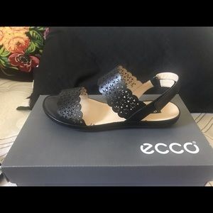 Cute black Ecco sandals.